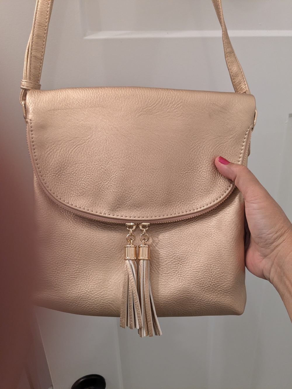 Women's Metallic Rose Gold Crossbody Bag with Tassel